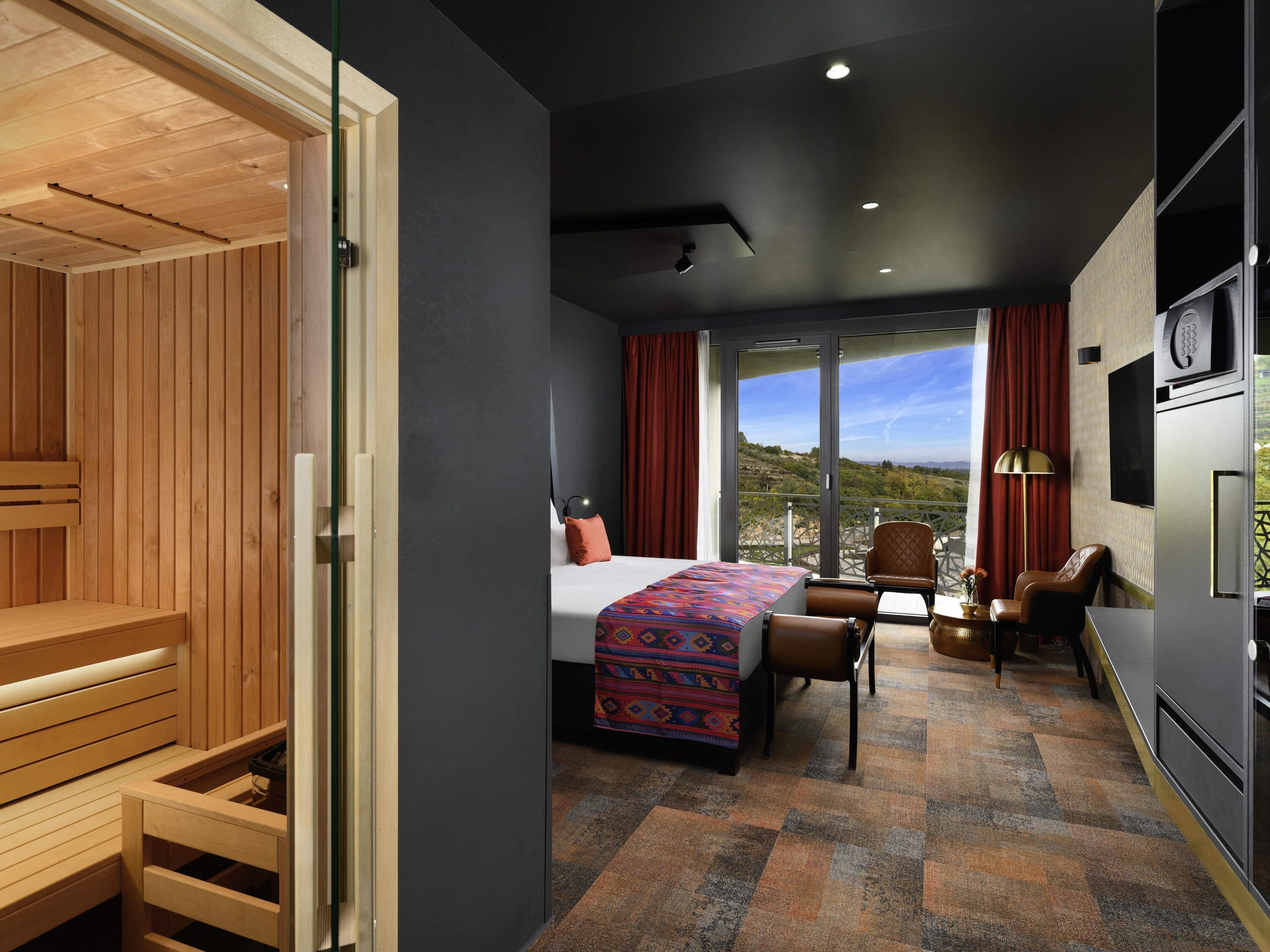 Deluxe Room, 1 King Bed, Sauna | Hypo-allergenic bedding, minibar, in-room safe, desk