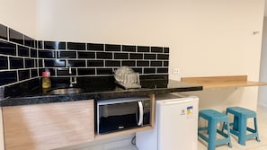 Estudio familiar | Cocina privada | Frigobar y microondas