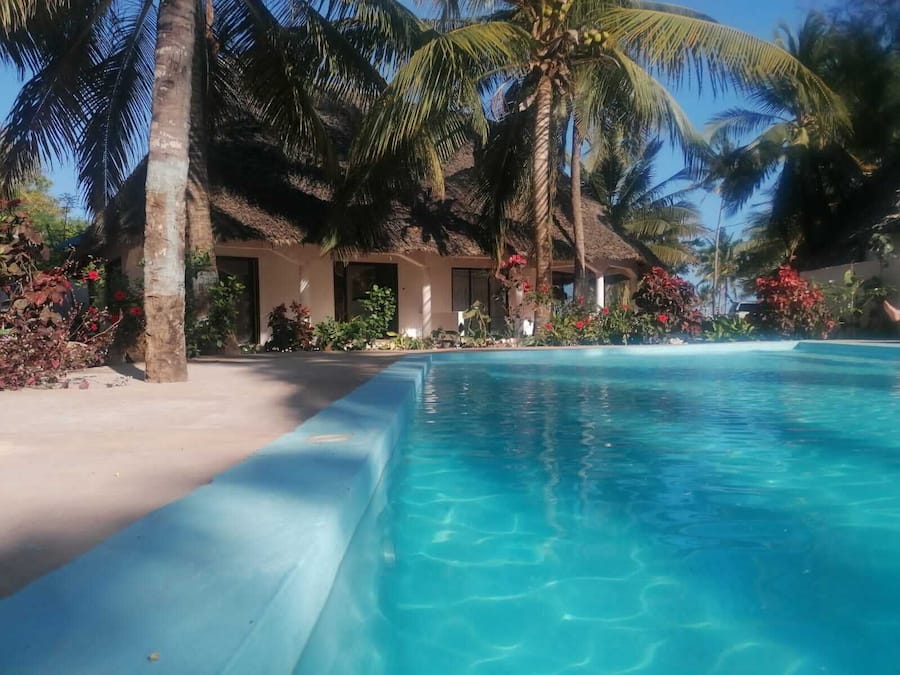 Standard Room, Pool View | Desk, laptop workspace, free WiFi, bed sheets