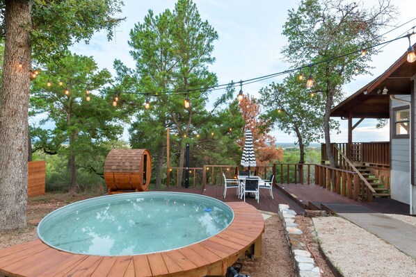 Outdoor dining - Pine Top View with the Club House, Sauna, Pool (Bastrop)