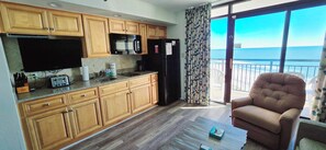 Fridge, microwave, stovetop, coffee/tea maker