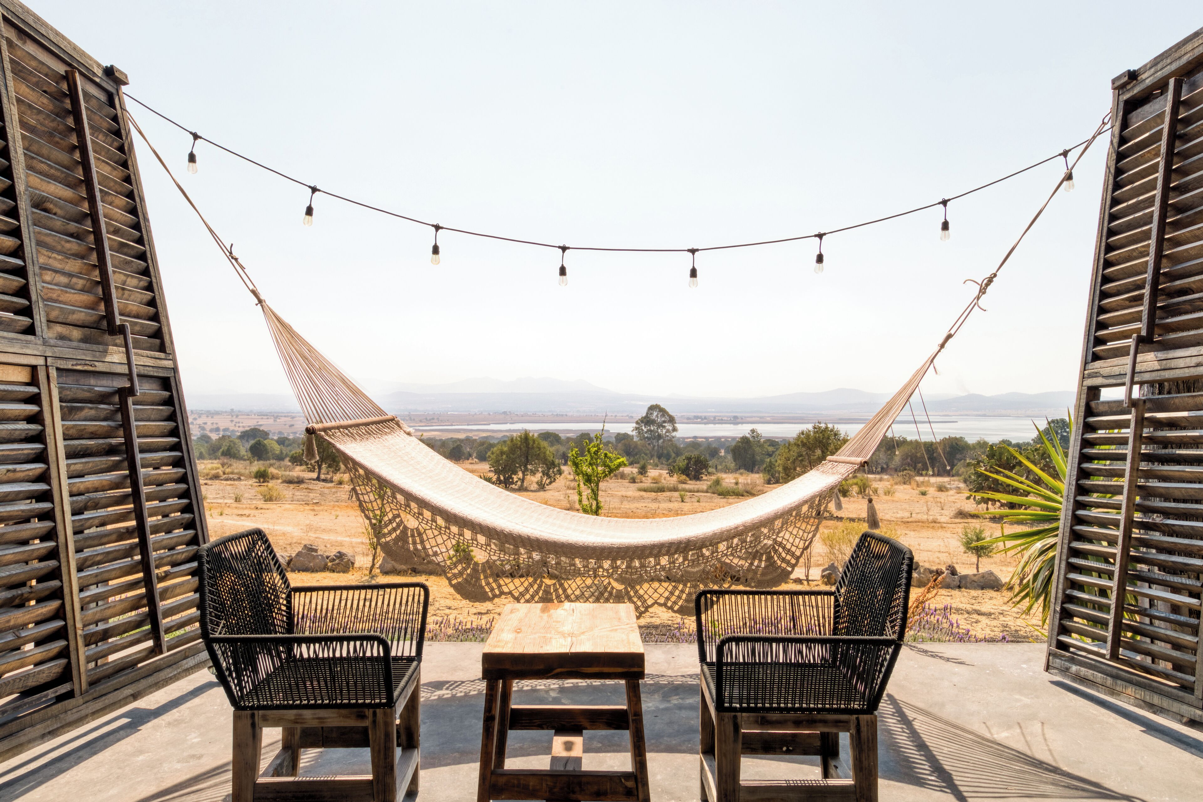 Habitación Deluxe, 1 cama de matrimonio, bañera, vistas a la laguna | Terraza o patio