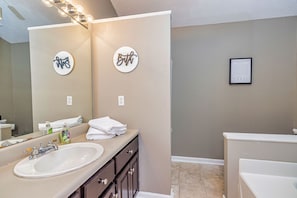 Combined shower/tub, hair dryer, towels, soap
