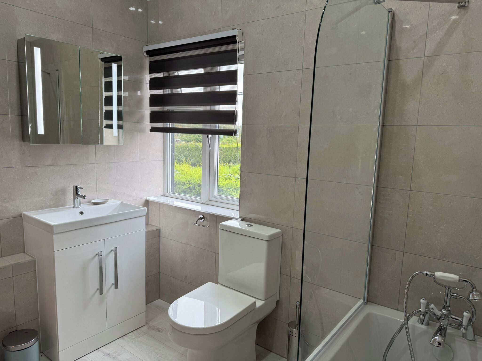 Combined shower/bathtub, deep-soaking bathtub, hair dryer, towels