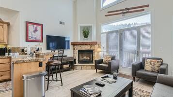 Smart TV, fireplace, books