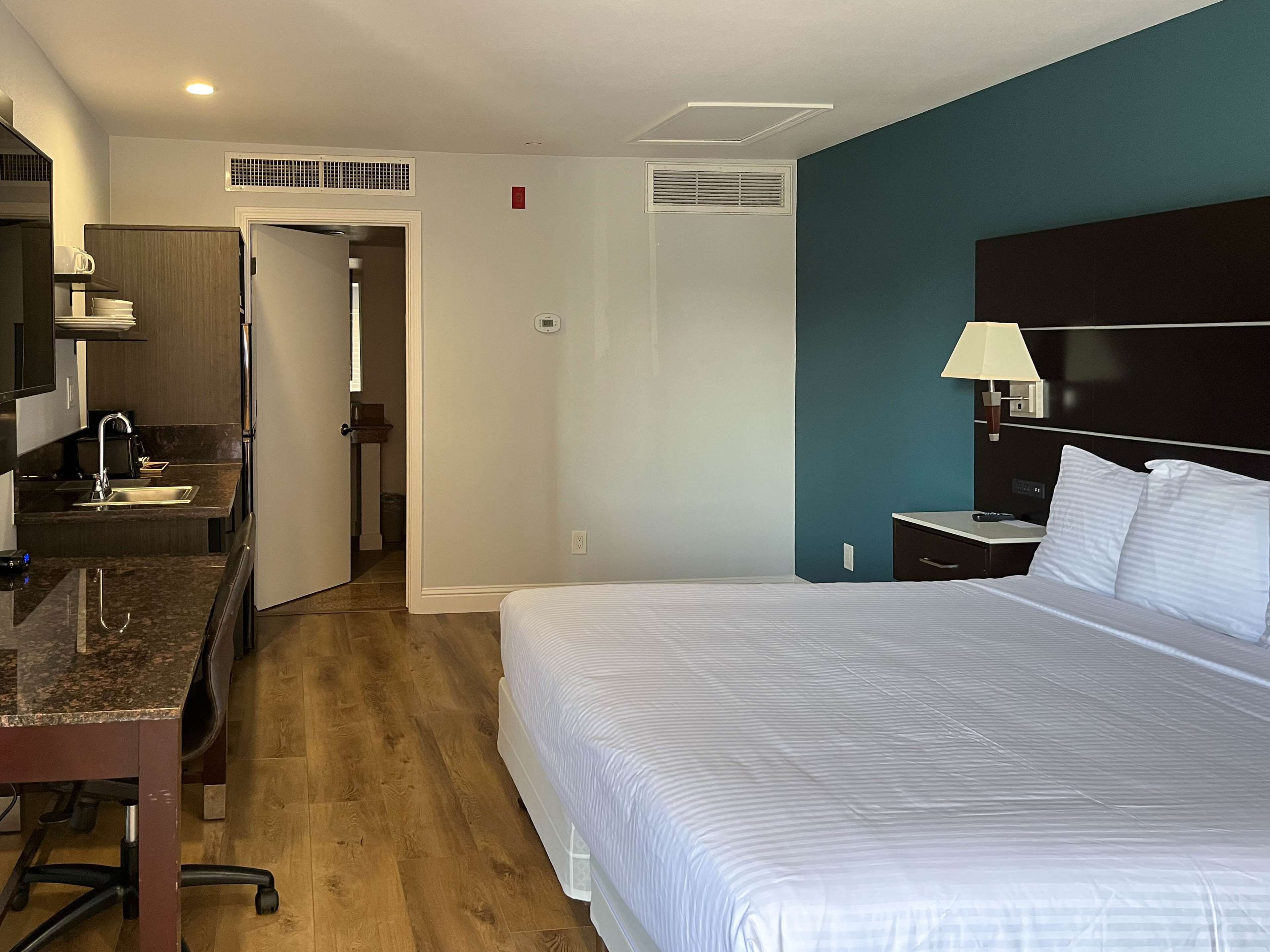 Desk, laptop workspace, free WiFi, bed sheets