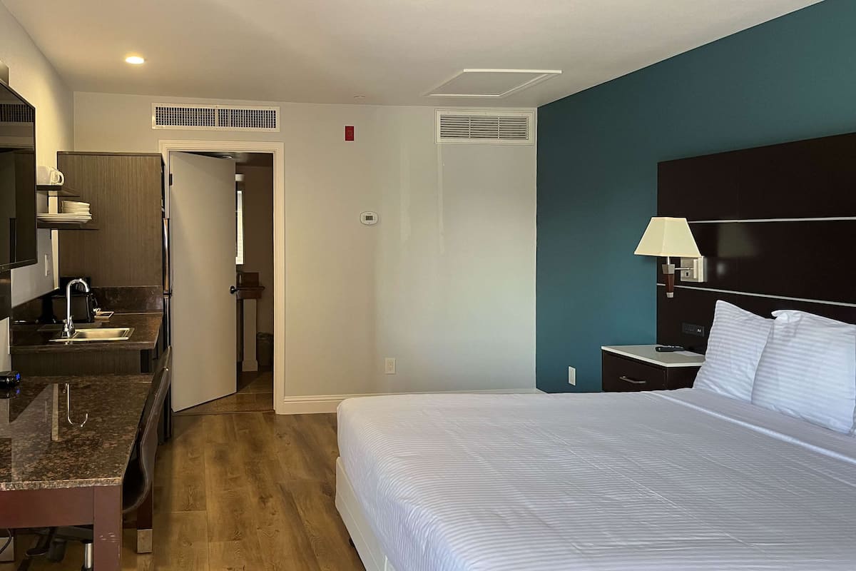 Desk, laptop workspace, free WiFi, bed sheets