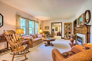 TV, fireplace, books