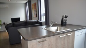 Loft avec un lit + divan-lit | Makan dalam bilik