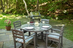 Dine on your private patio under the trees to the sound of a babbling brook…