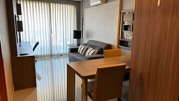 Apartment | Living area | 42-inch Smart TV with satellite channels, streaming services