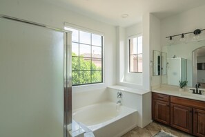 Combined shower/tub