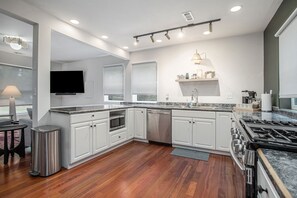 Fridge, microwave, oven, stovetop - The Neighborhood Hotel Grand Beach Cottage 13 - King, Queen, & Twin Bed, Pet Friendly (Grand Beach)