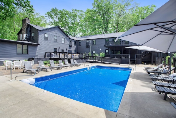 A heated pool - The Neighborhood Hotel Grand Beach Cottage 13 - King, Queen, & Twin Bed, Pet Friendly (Grand Beach)