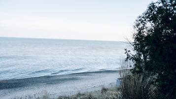 On the beach, sun-loungers, beach towels