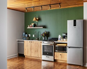 Fridge, microwave, oven, stovetop - The Neighborhood Hotel Grand Beach Suite 1 - Three Bedroom (Grand Beach)