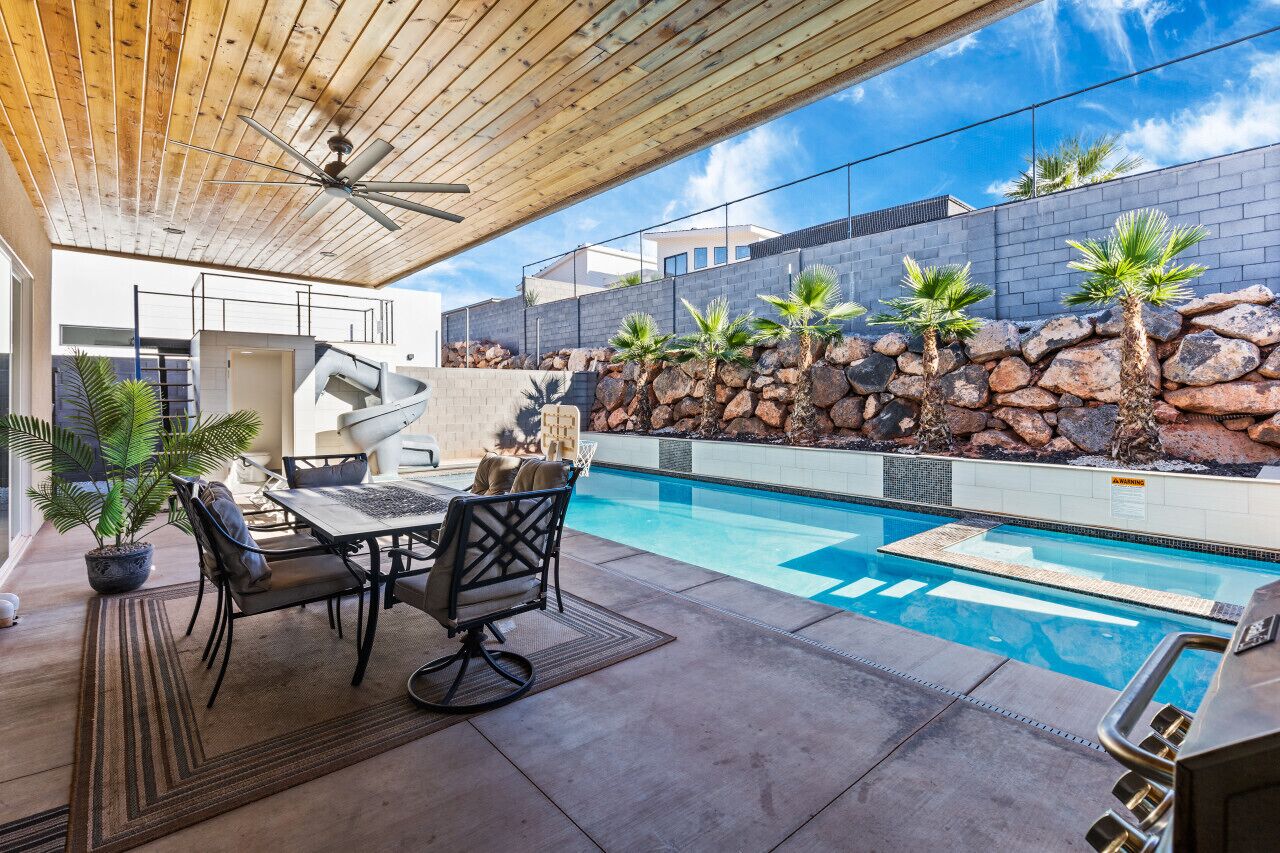 Private pool with rooftop slide and hot tub