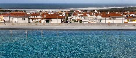 Seasonal outdoor pool, pool loungers