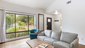 Smart TV, fireplace, books, offices