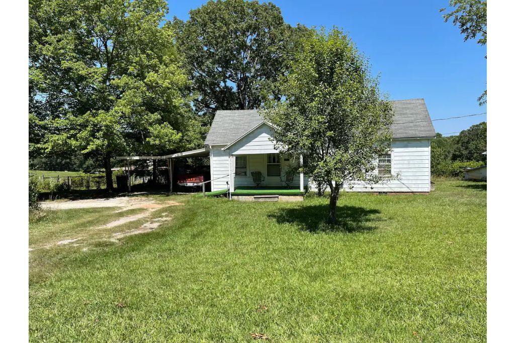 Historical farm house on beautiful pasture land