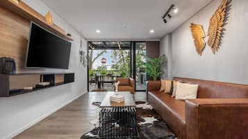 Apartment (114) | Living area | 50-inch Smart TV with cable channels, TV