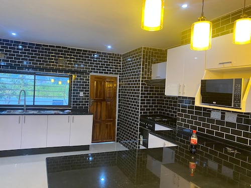 Fully furnished 3 bedroom family sized apartment --15 minutes from the airport..