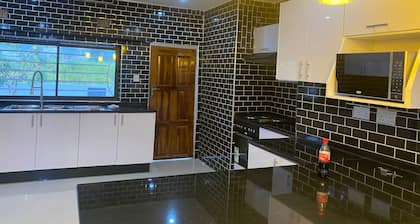 Fully furnished 3 bedroom family sized apartment --15 minutes from the airport..