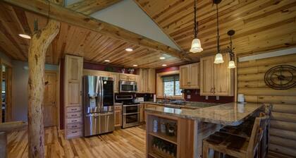 Cabin close to Nemo, private stocked pond and hot tub great for families!