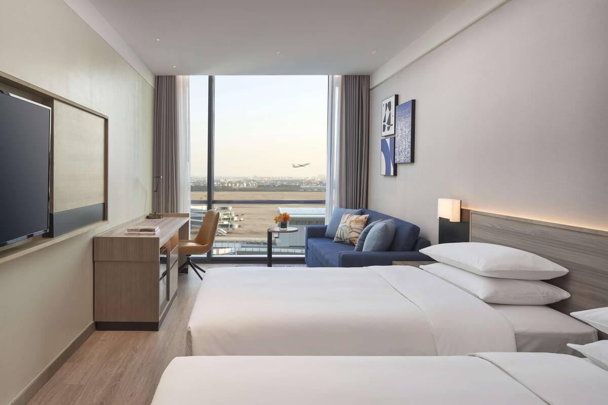 airport view two twin beds (with sofa bed) | view from room