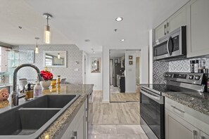 Fridge, microwave, oven, stovetop - The Pond - The Full Package (Vancouver)