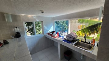 Fridge, microwave, cookware/dishes/utensils