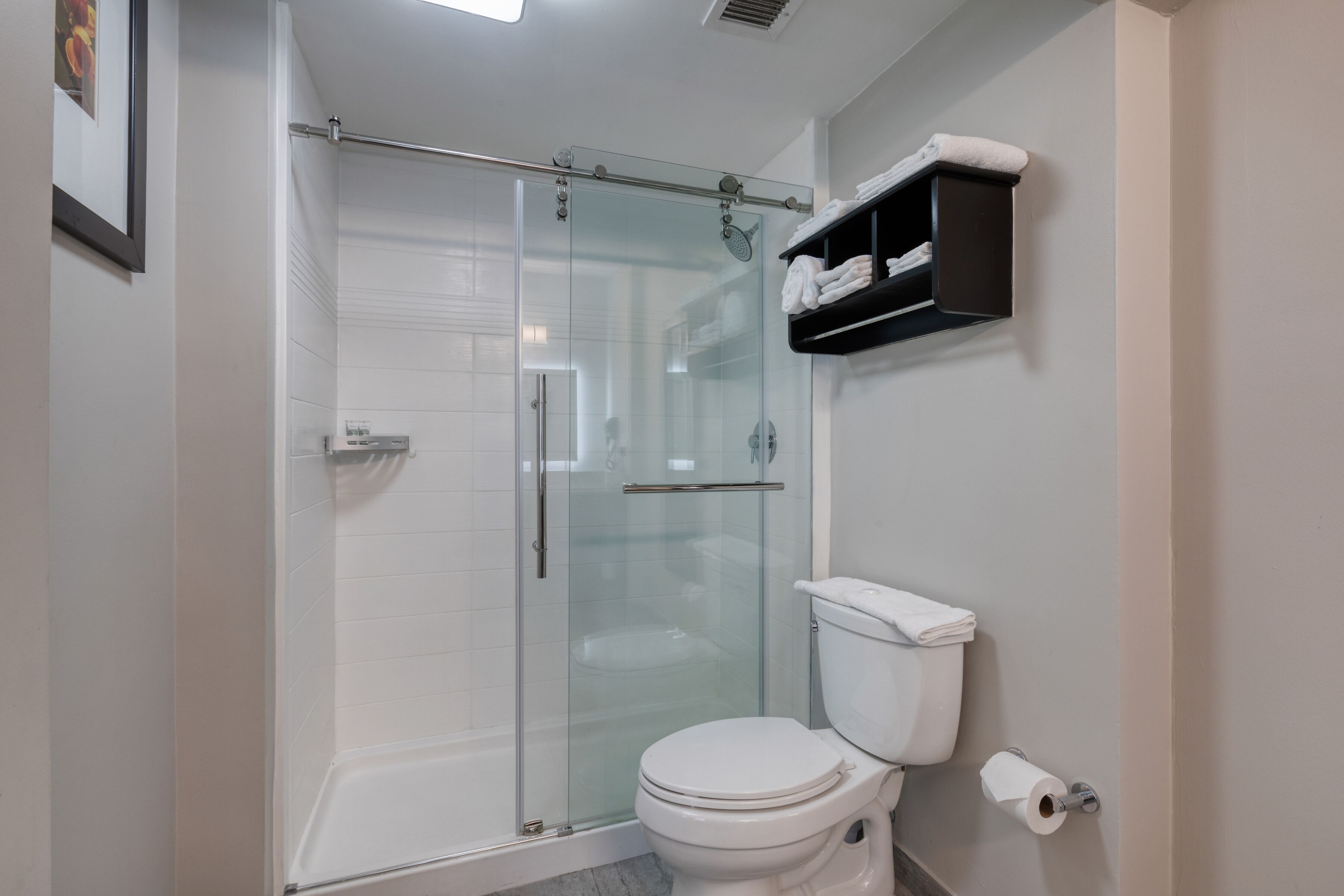Grand Studio Suite, Multiple Beds, Non Smoking, Refrigerator & Microwave | Bathroom | Shower, free toiletries, towels, soap