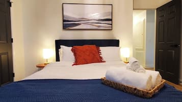 2 bedrooms, desk, blackout drapes, iron/ironing board