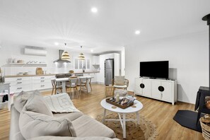 Smart TV, fireplace, books