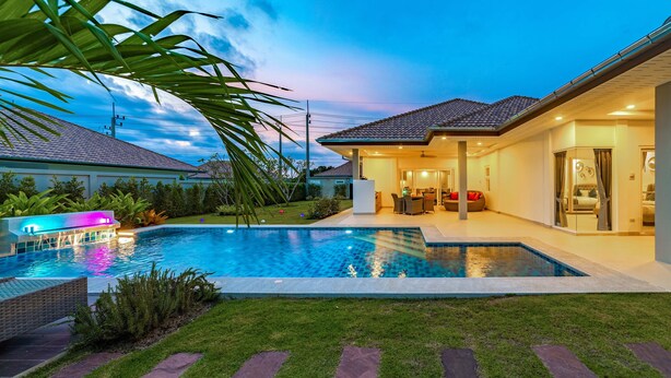 A modern house with a swimming pool, a patio, and a well-maintained lawn. - Private 3 Bedroom Pool Villa MS22 (Hua Hin)