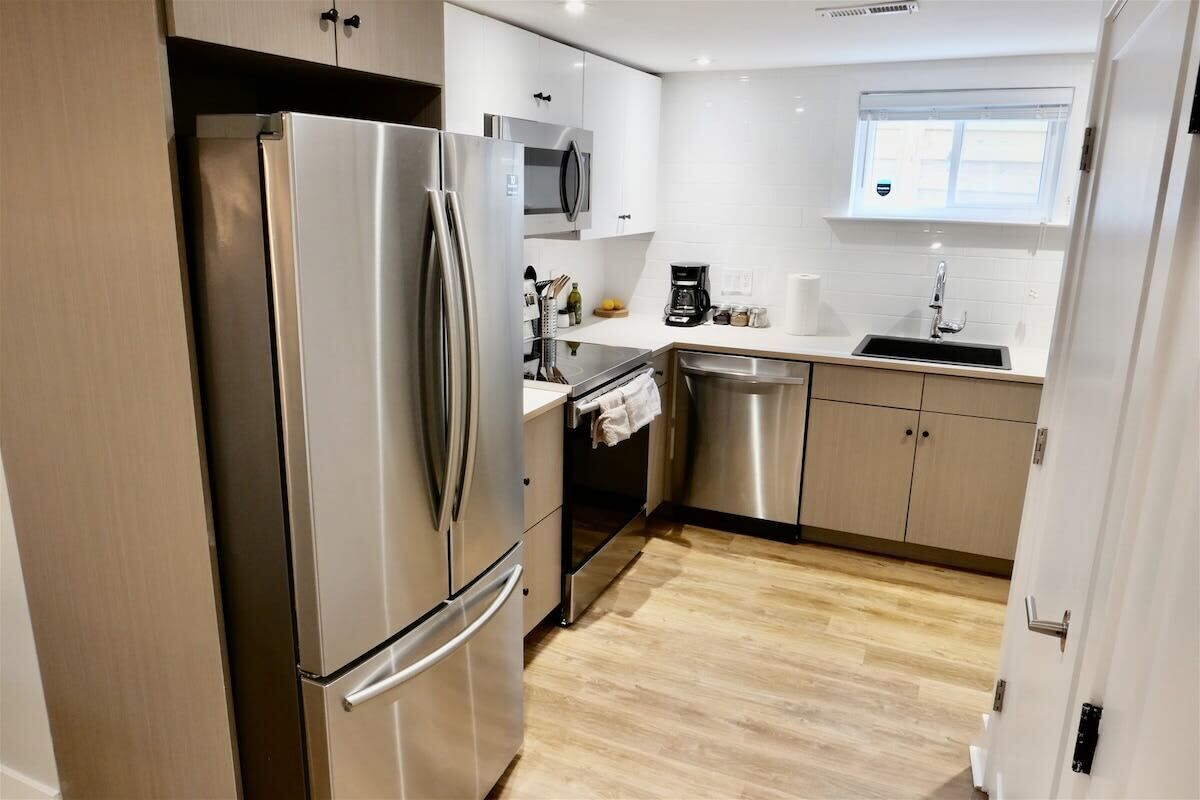 Coffee/tea maker, fridge, microwave, cookware/dishes/utensils