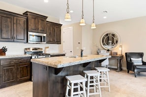 Townhome, 3 Bedrooms | Private kitchen | Fridge, oven, coffee/tea maker, toaster