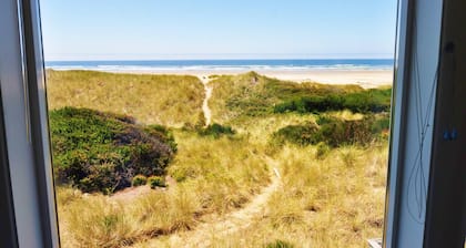 New Listing! Cozy beachfront getaway with amazing views and miles of sandy beaches