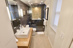 Bathtub, hair dryer, towels