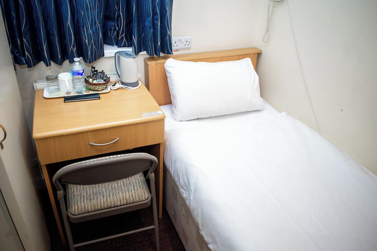 Standard Single Room | Desk, laptop workspace, blackout drapes, iron/ironing board