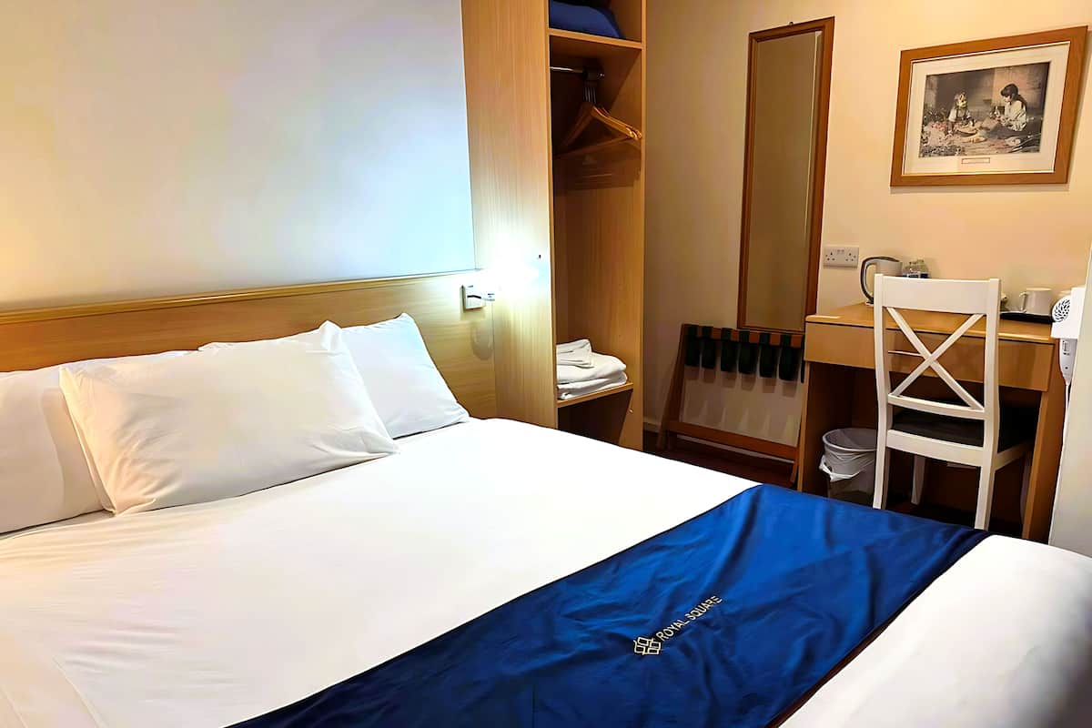 Classic Double Room | Desk, laptop workspace, blackout drapes, iron/ironing board