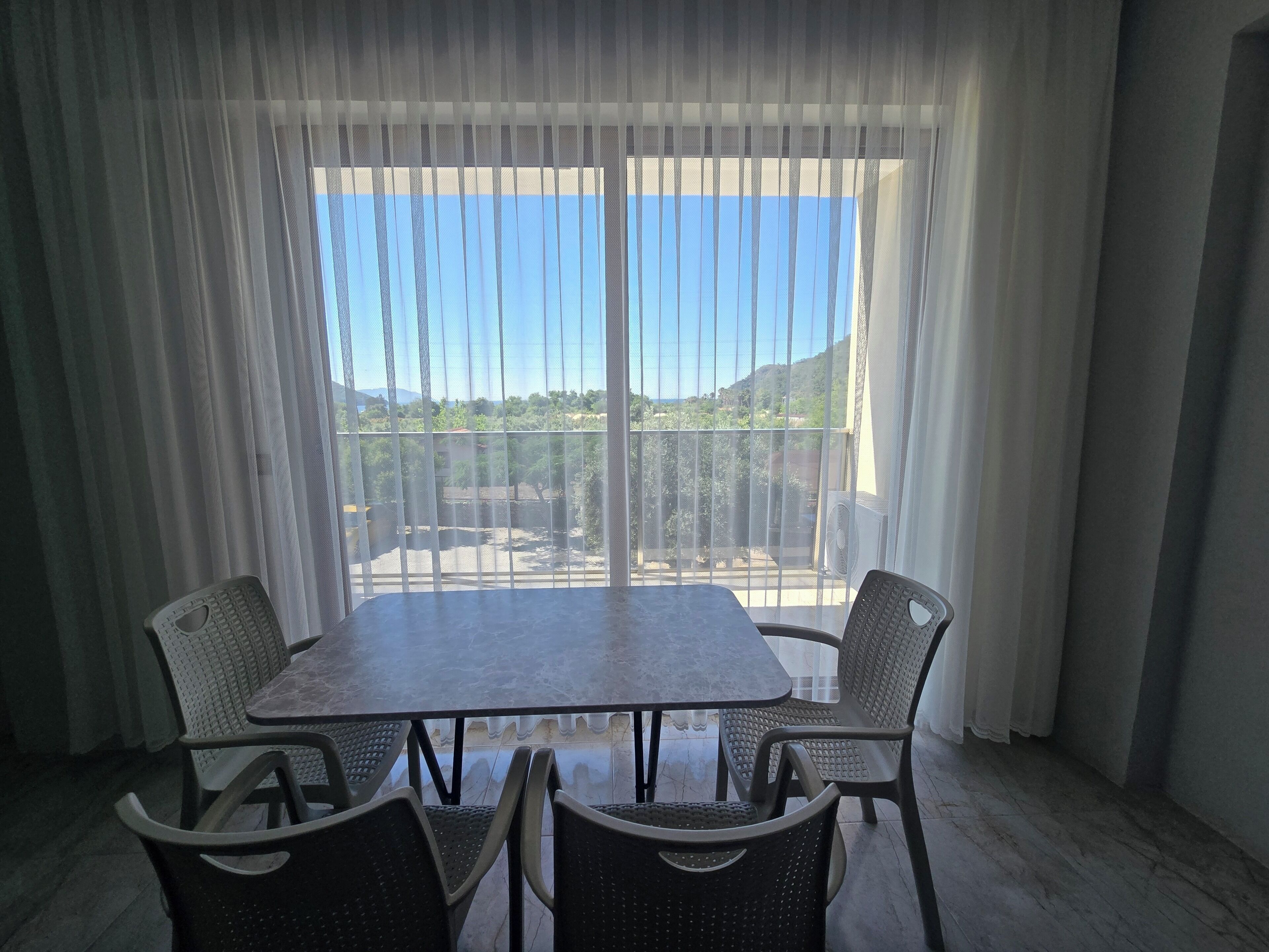 Family Apartment, 1 Bedroom, Non Smoking, Sea View | Living area | 32-inch LED TV with satellite channels, computer monitors