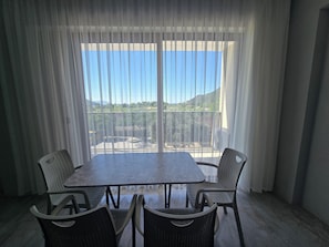 Family Apartment, 1 Bedroom, Non Smoking, Sea View | Living area | 32-inch LED TV with satellite channels, computer monitors - OLIVE TREE APART HOTEL (Koycegiz)