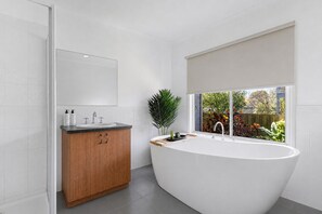 Bathtub, hair dryer, towels