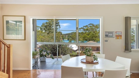 Dining. Pretty Beach Bay Vista by HolidayCo.