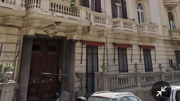 A multi-story building with ornate balconies and large windows. - Napoli SottoSopra a Chiaia, Elegant central apartment for groups and families (Napoli)