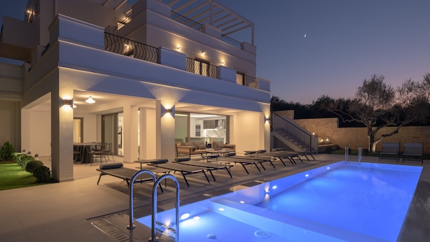 A modern two-story house with a swimming pool, outdoor seating, and a staircase leading to the upper floor. - Ivory Villa, Heated Pool, Hot Tub, Sauna & Gym (Perama)