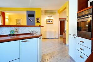 Cucina privata | Frigorifero, piano cottura, macchina per caffè espresso, tostapane