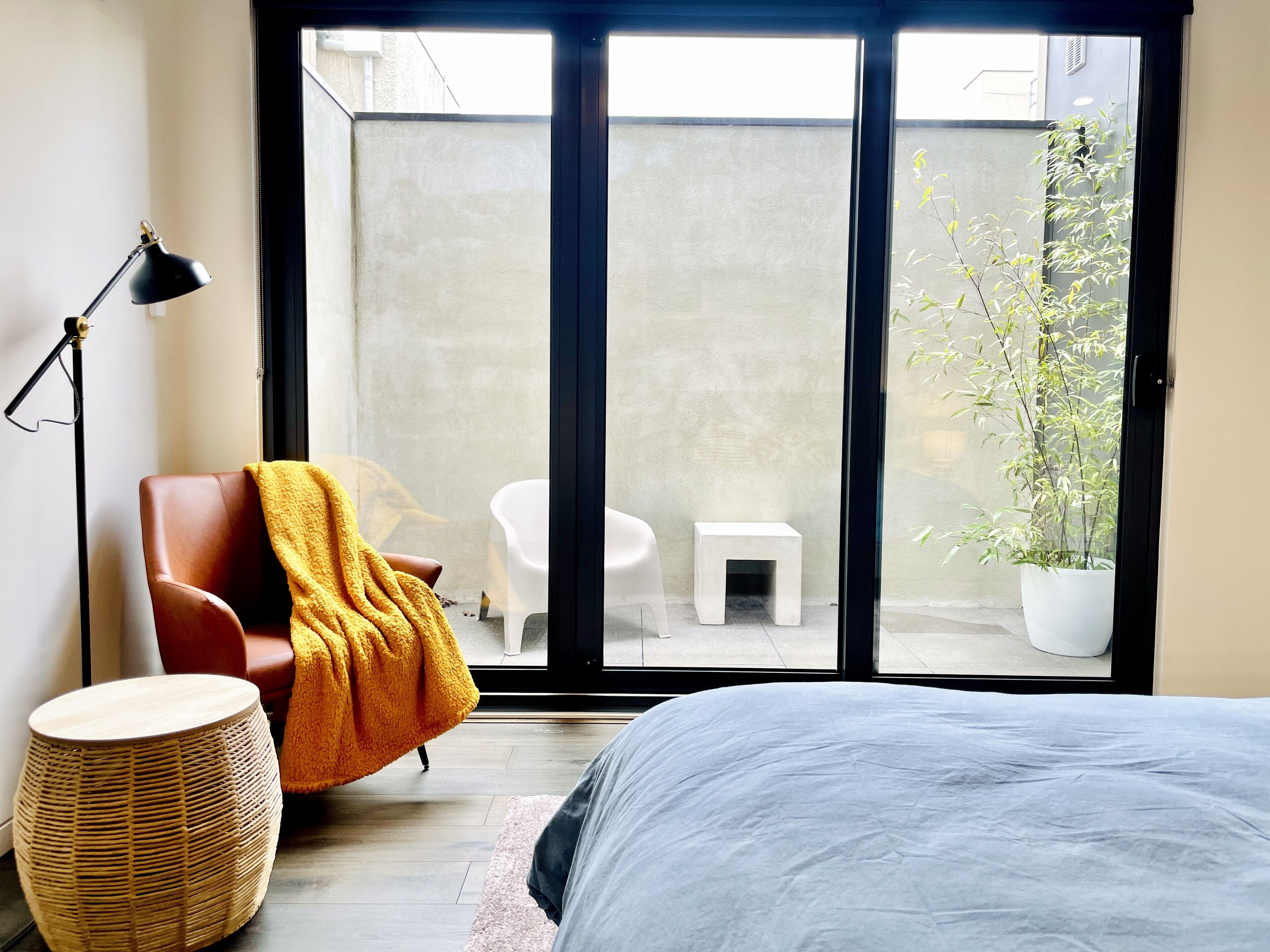 master bed with outdoor courtyard