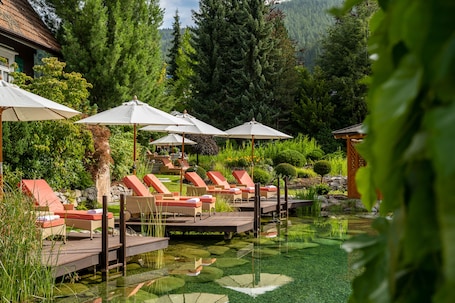 5 indoor pools, 4 outdoor pools, open 7:30 AM to 7:30 PM, pool umbrellas. Hotel Bareiss